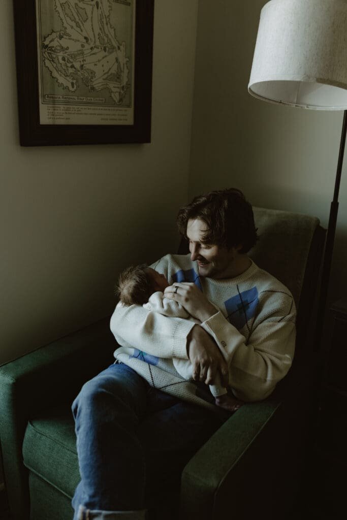 Dad holding baby